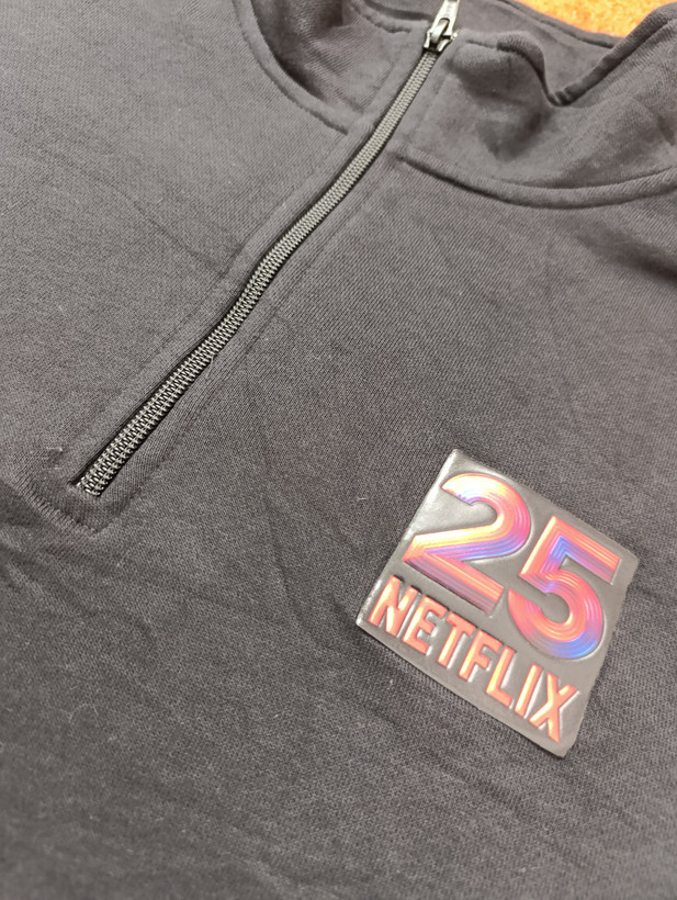 نیمزیپ مردانه طرح NETFLIX 25 از برند Sport-Tek
